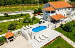 Awesome apartment in Gruda with Outdoor swimming pool, WiFi and 3 Bedrooms